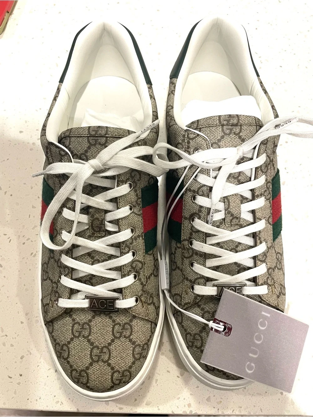Gucci Ace low-top sneakers in GG Supreme canvas. New With Tags / Never Worn.